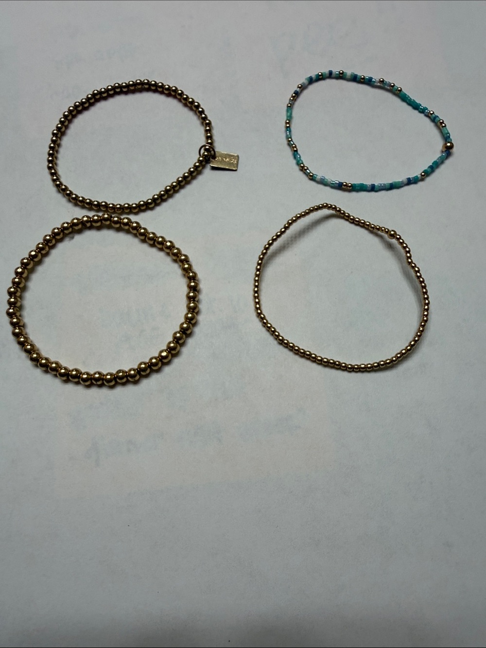 enewton bracelet stack. One has Seaside charm.